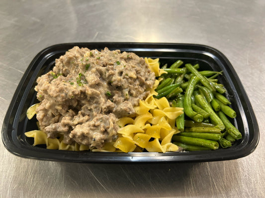 Ground beef stroganoff over egg noodles