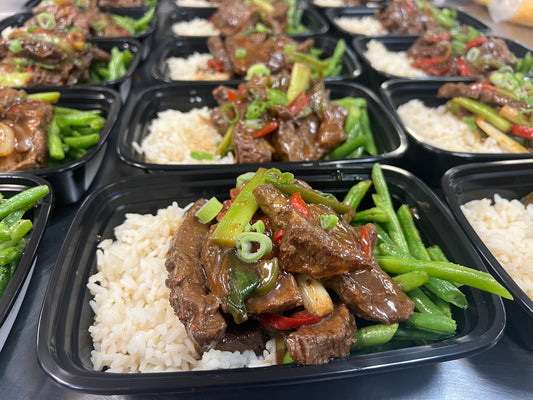 Chinese pepper steak over white rice